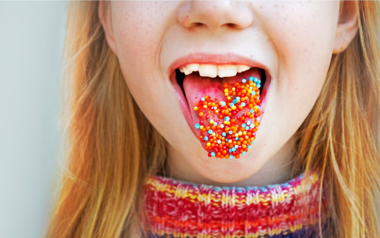 Child With Candy Covered Tongue