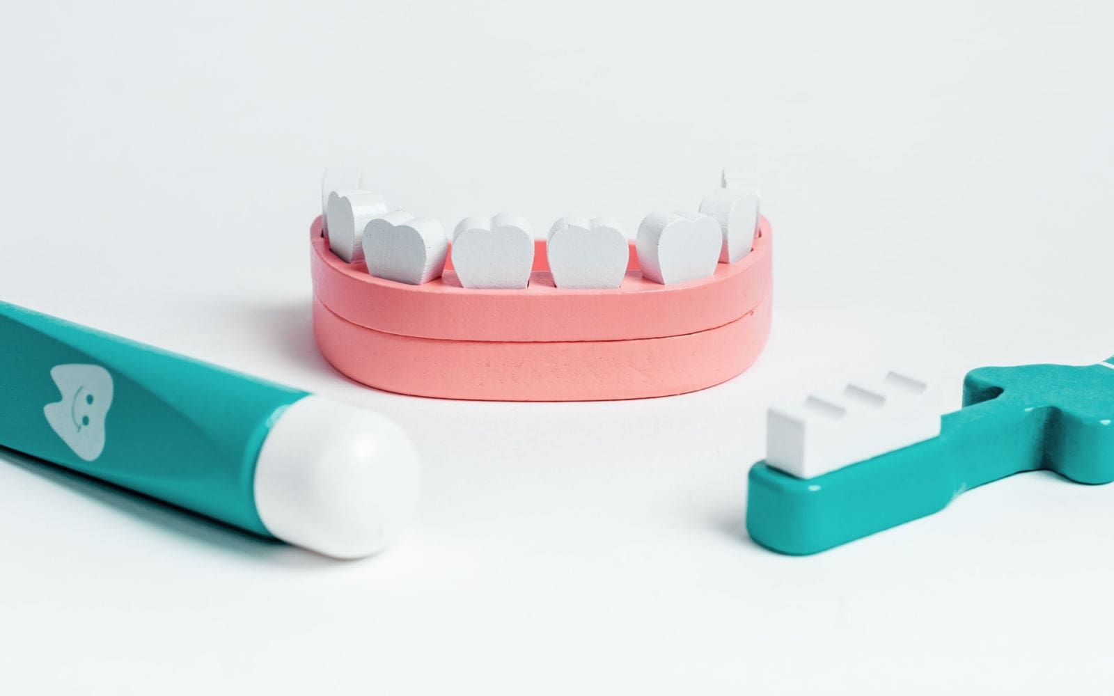 Dental toy with teeth, toothbrush and toothpaste