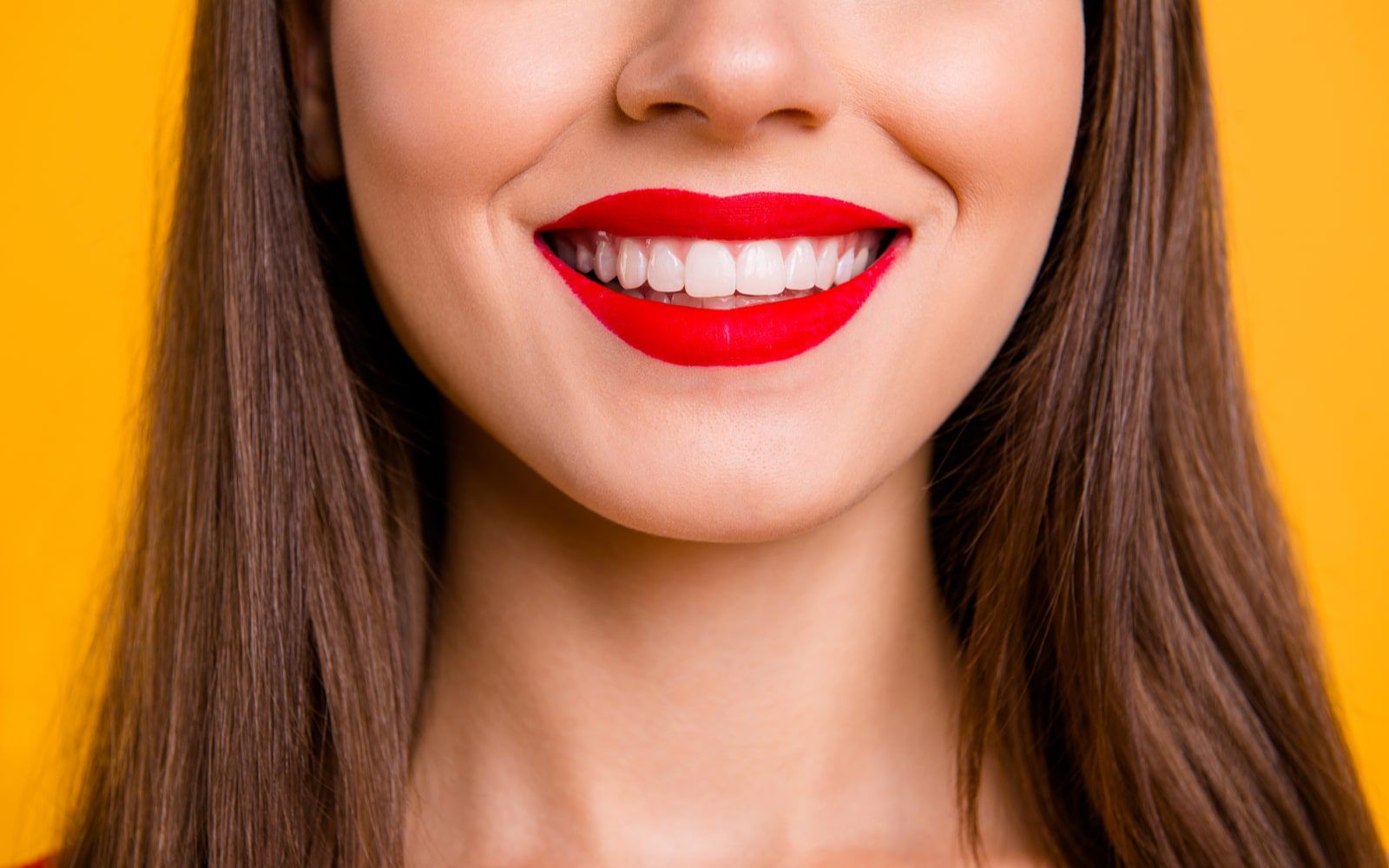 Woman With Healthy Gums Smiling Up Close
