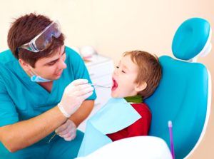 Young boy having a dental exam