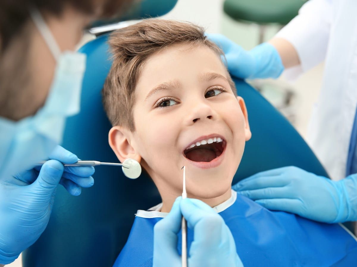 Smiling Kid At Dentist